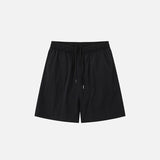 Front view of the black Loose Solid Color Sports Shorts in a gray background 