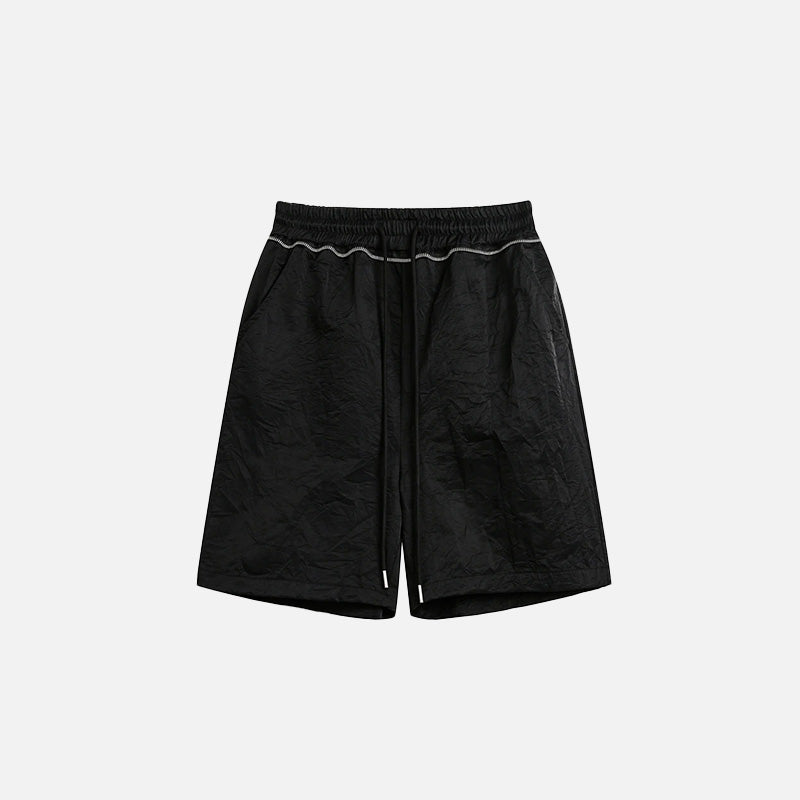 Front view of the black Basic Drawstring Shorts in a gray background 