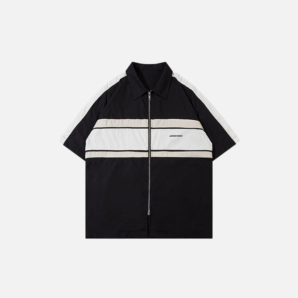 Front view of the black Sports Loose Polo Zip-up Shirt in a gray background 