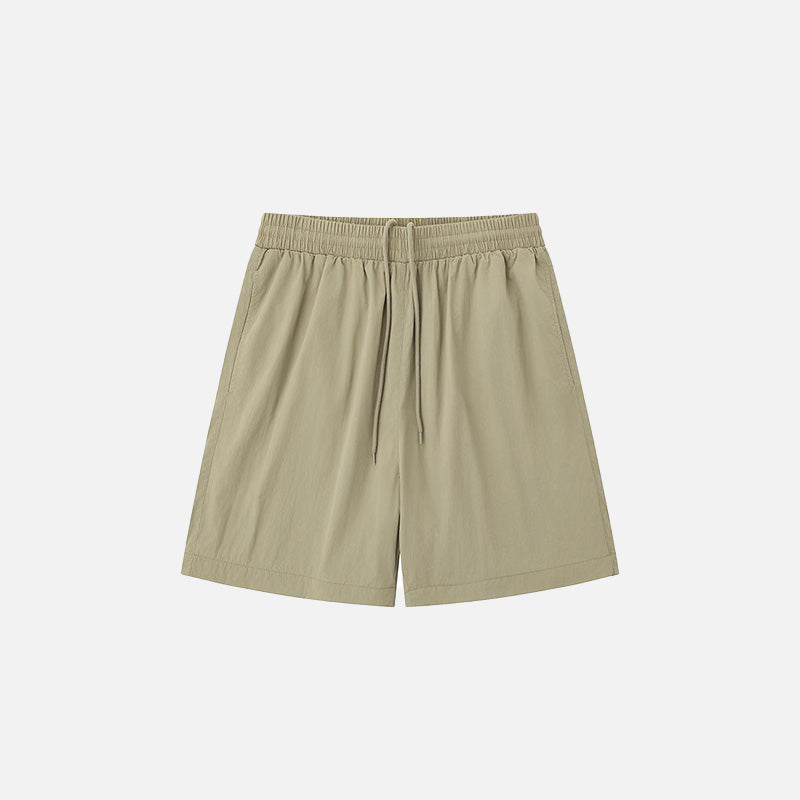 Front view of the khaki Loose Solid Color Sports Shorts in a gray background 