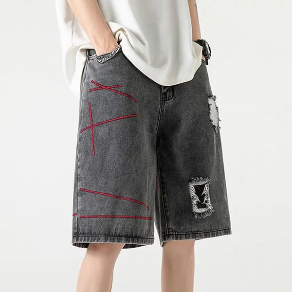 Stylish Spliced Button Zipper Ripped Shorts