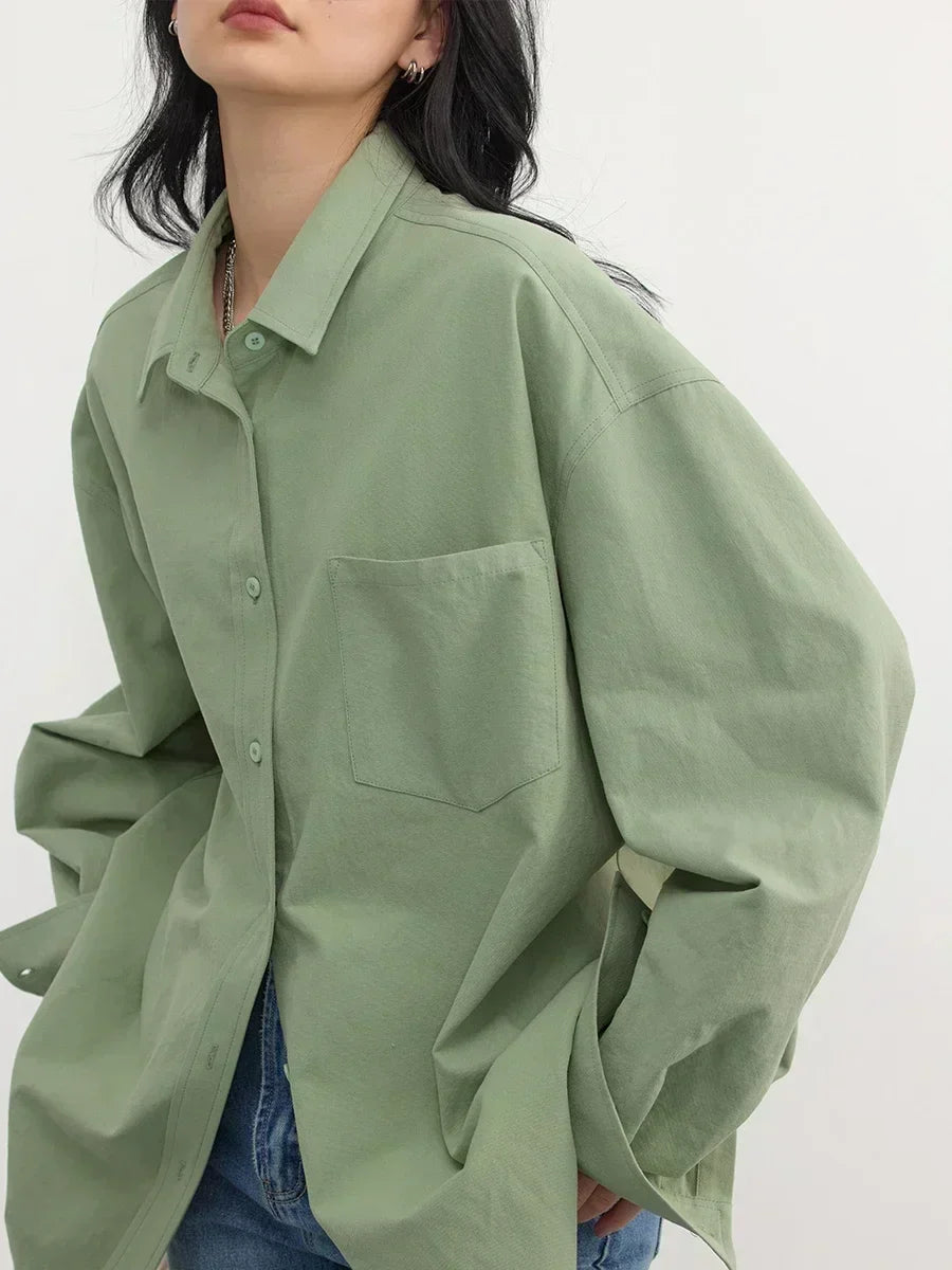 Model wearing the green Relaxed Fit Button-Up Shirt