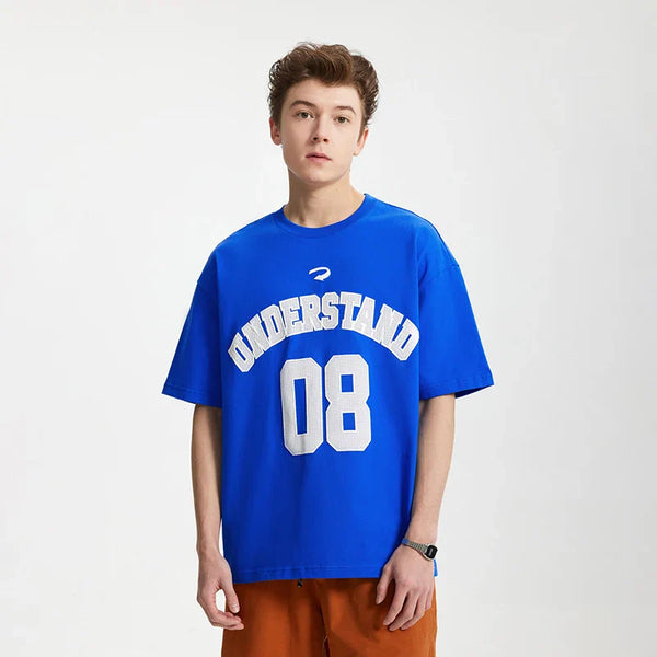 Model wearing the blue Understand 08 T-Shirt